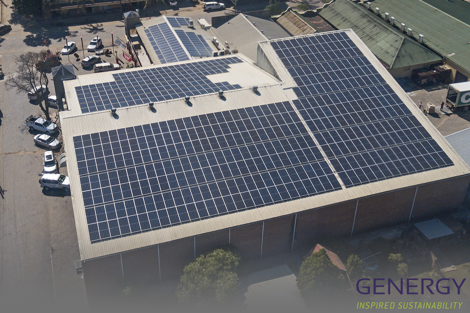Aerial photo of Solar installation with writing: GENERGY Inspired Sustainability