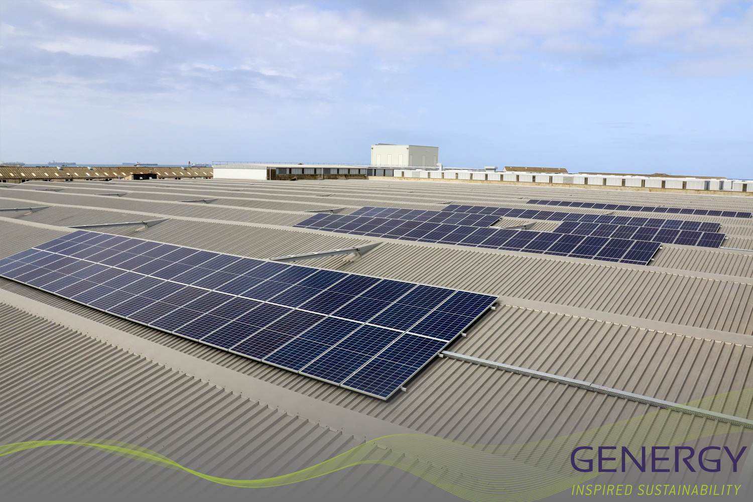 Solar Panels on rooftop with writing: GENERGY, Inspired Sustainability