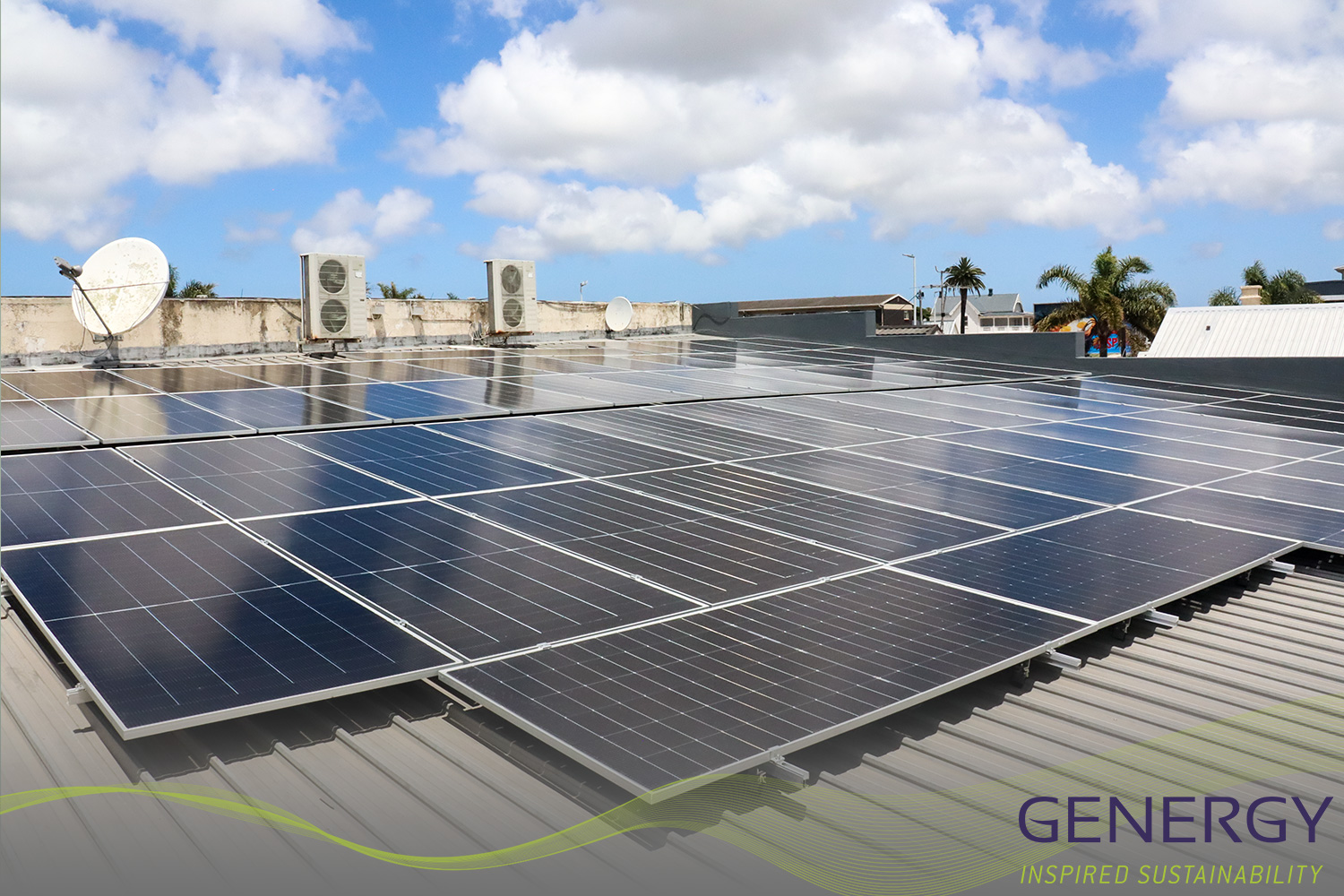 solar panels on rooftop with green lines logo at bottom of the image and writing in bottom right corner: GENERGY, Inspired sustainability